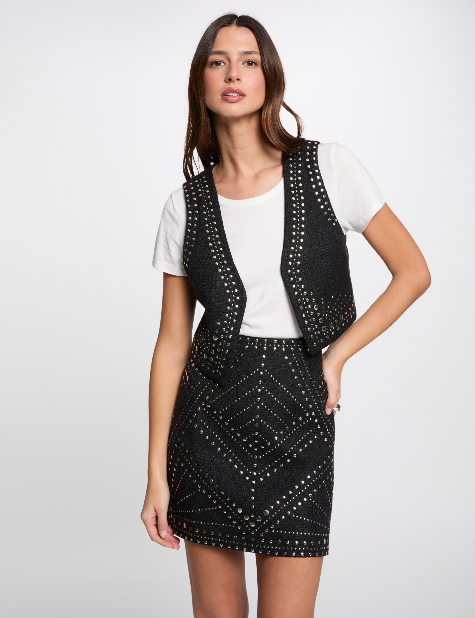 Gilet sans manches clous noir femme