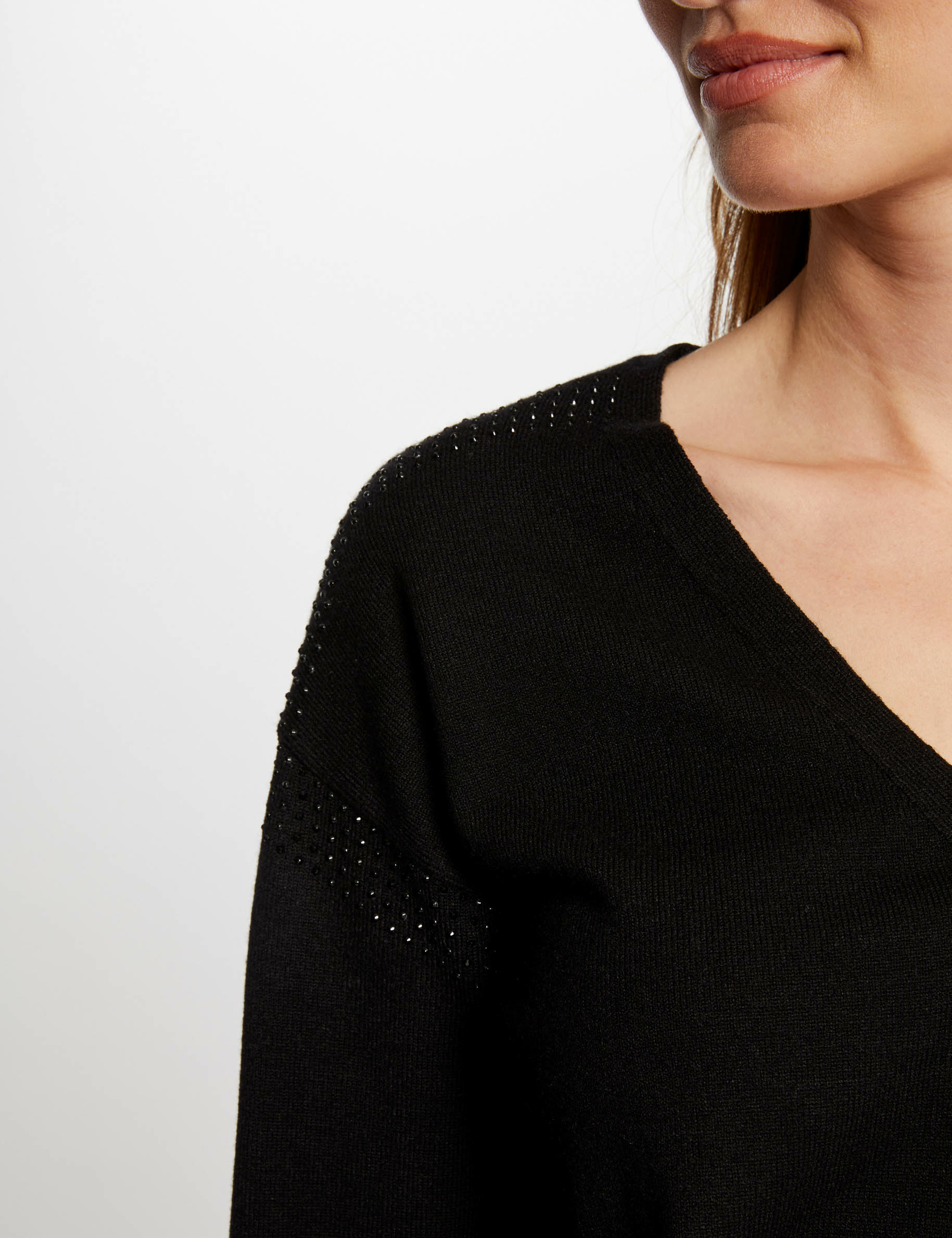 Pull manches longues à strass noir femme